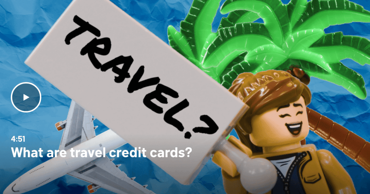 lego guy holding a travel sign